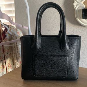 Black mini boxy magnetic closure bag- a new day